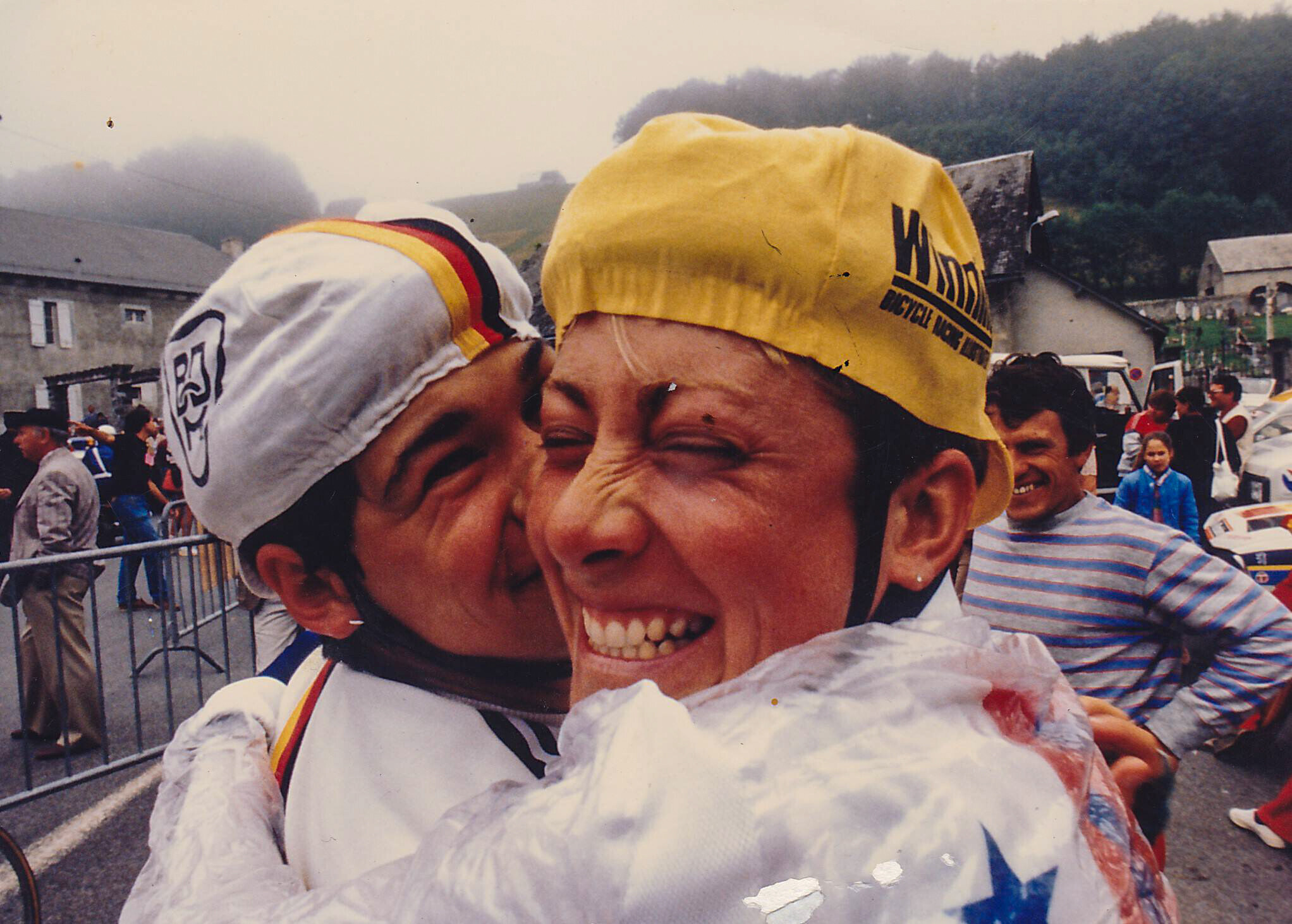 Two riders celebrate after finishing a stage of the Tour de France F&eacute;minin in the 1980s.
